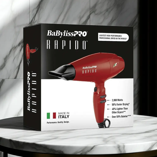 Red hair dryer retail box with black nozzle and front control panel