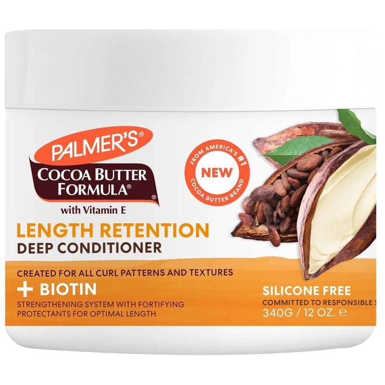 Cocoa Butter Biotin Length Retention Deep Conditioner in a white jar with cocoa beans and nuts on the label.