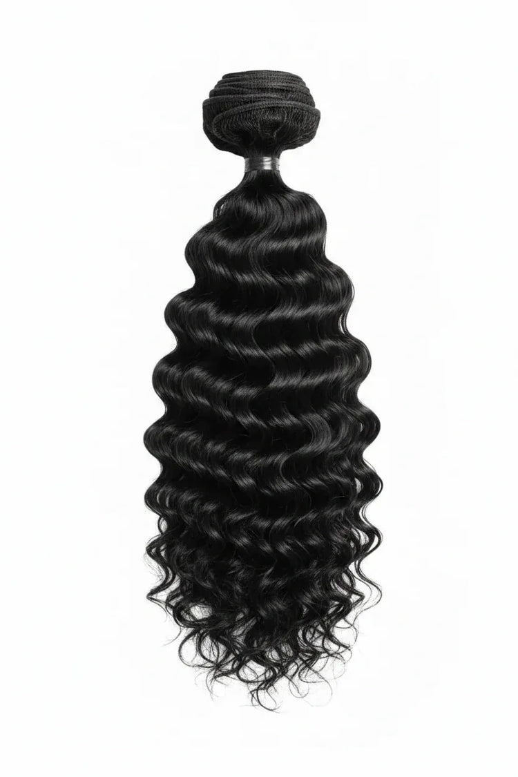 Black curly hair bundle with a visible brand label on a gray background