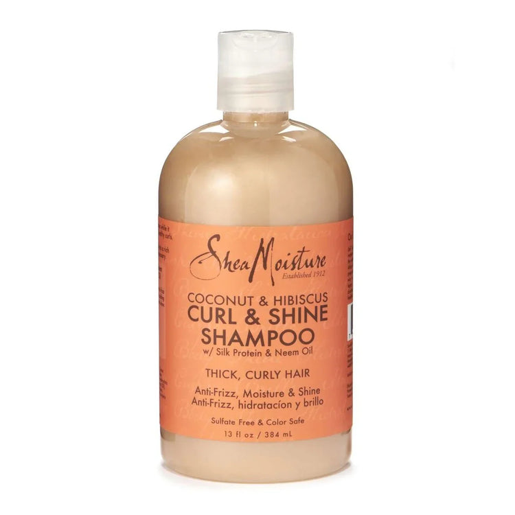 Shea Moisture Coconut Hibiscus Curl Shine Shampoo bottle for thick, curly hair, sulfate-free and moisturizing.