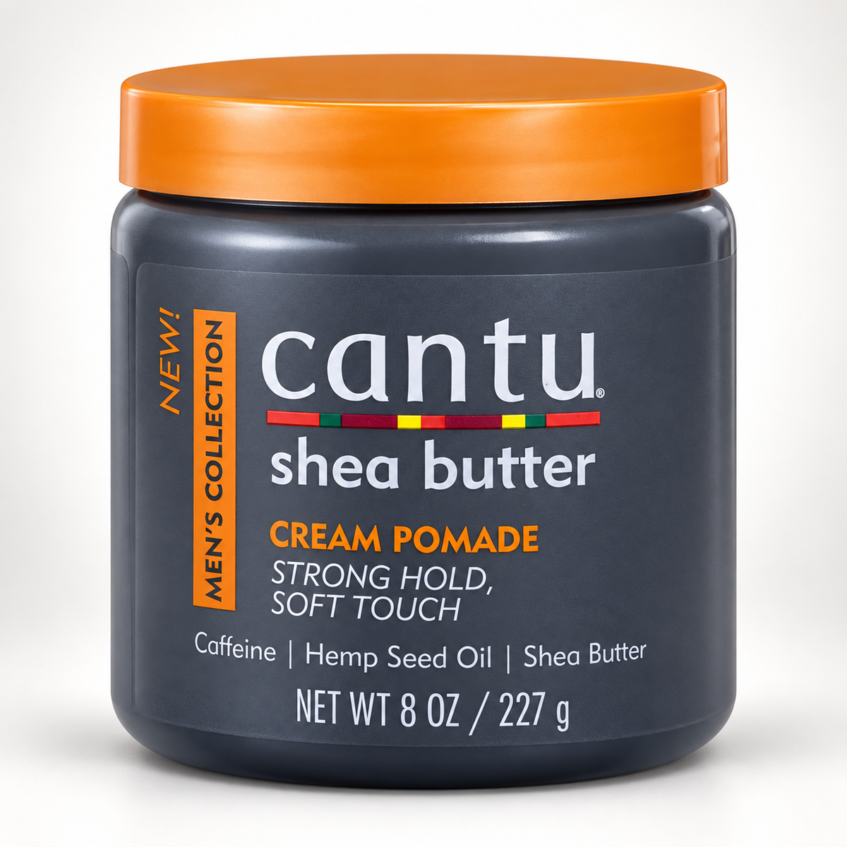 Close-up of shea butter cream pomade jar with orange lid and dark gray body