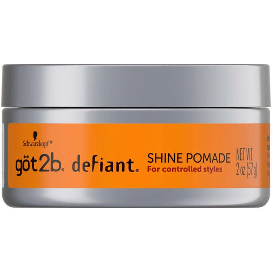 Hair shine pomade jar with gray lid and orange front label for controlled styles