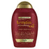 Ogx keratin smoothing oil shampoo bottle with 5-in-1 benefits for frizz-free hair care.